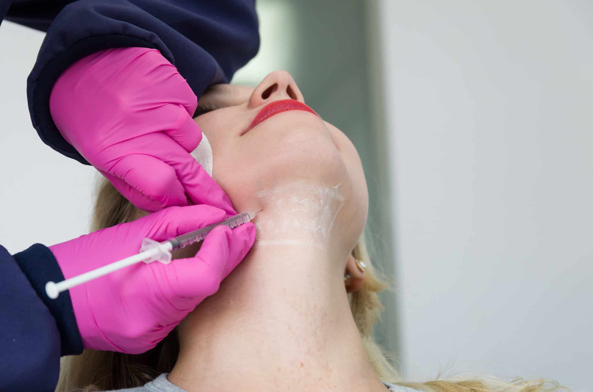 Young Female Receiving Kybella Treatment in Humble, TX | Centurion Injects and IV Drips