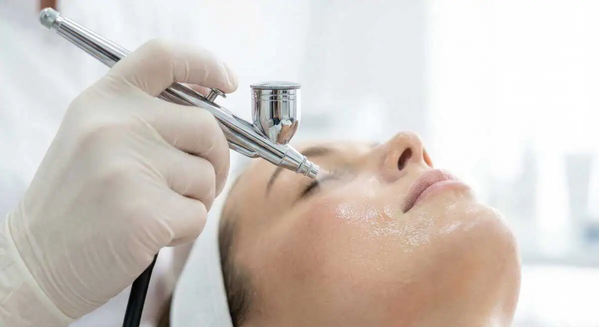 woman receiving oxivelour oxygen facial treatment for hydrated glowing skin in Humble TX