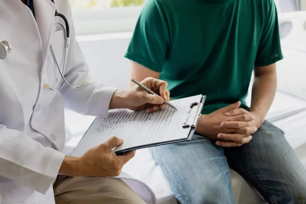 Doctor consulting male patient about low testosterone and TRT treatment in Humble, TX